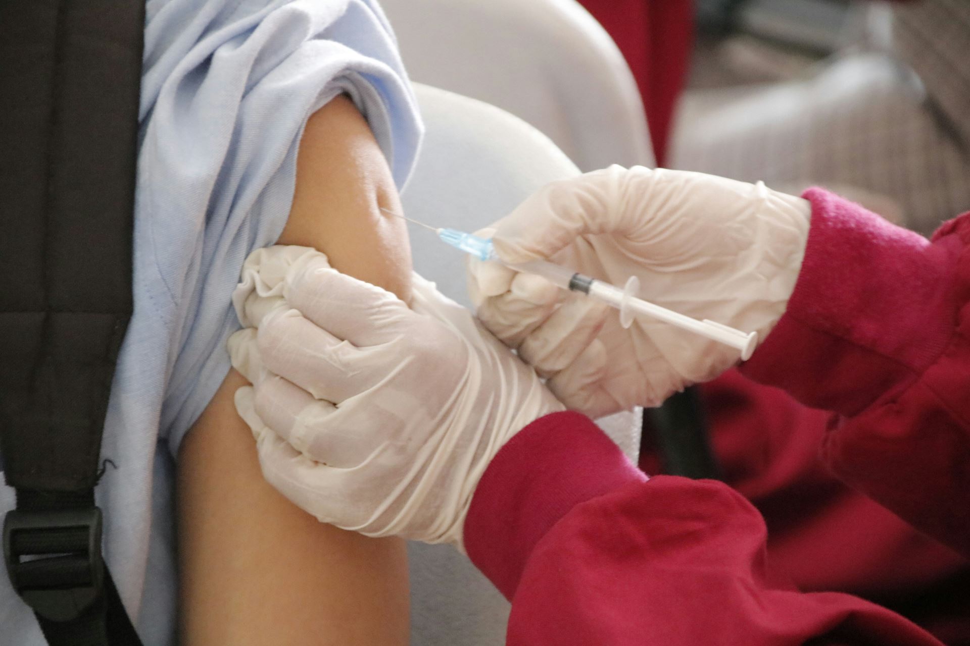 person being given vaccine in arm